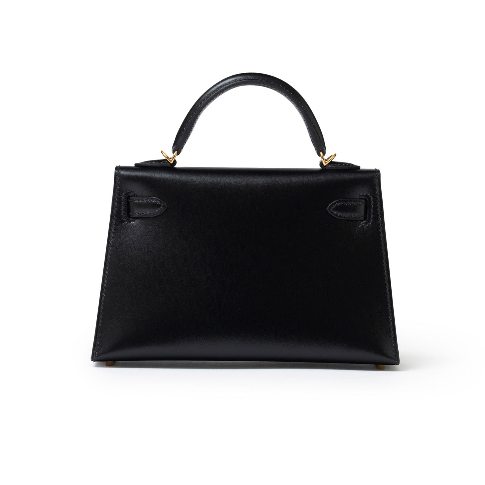 Back view of Hermès Mini Kelly II Sellier 20 Black Box Gold Hardware handbag with top handle and smooth leather finish