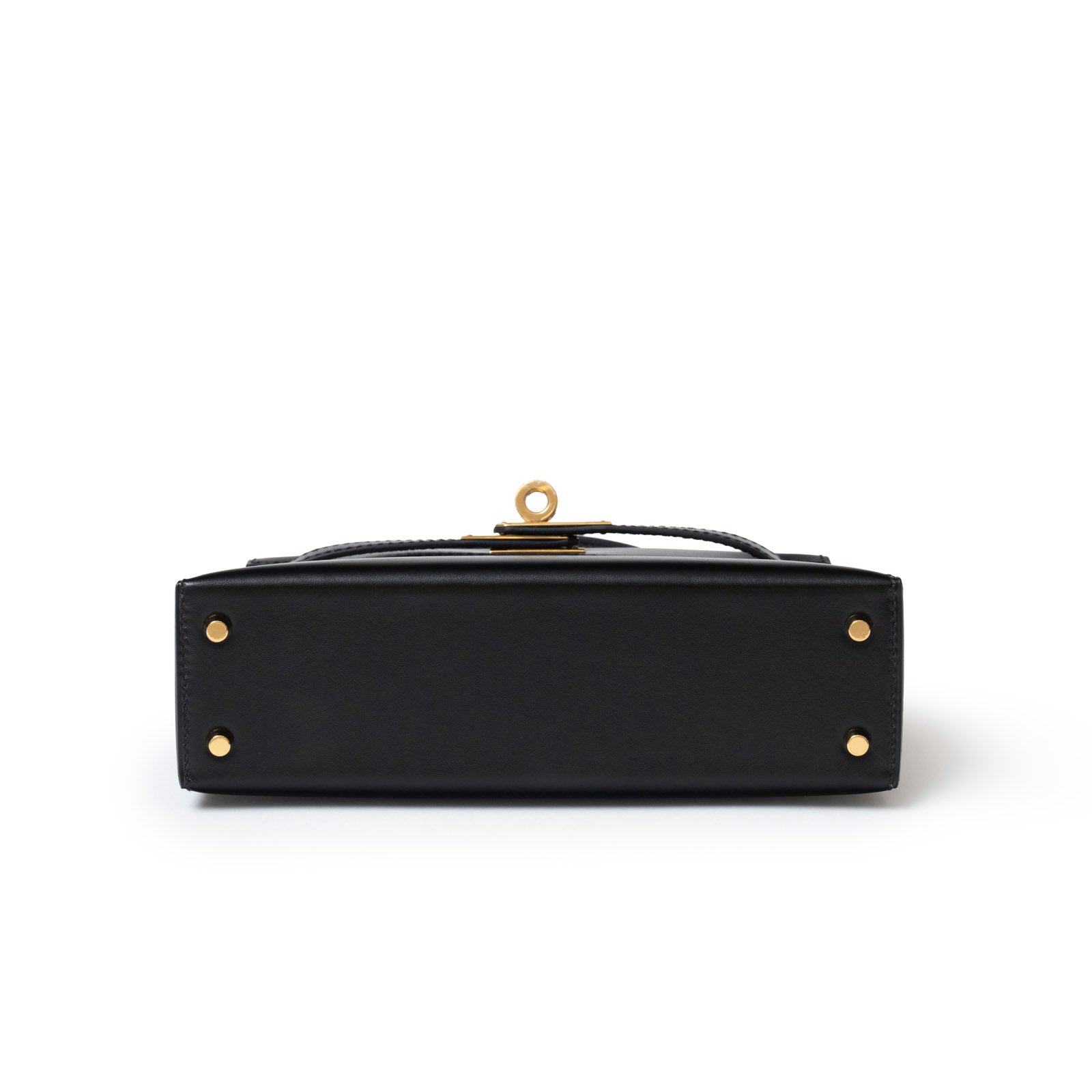 Bottom view of Hermès Mini Kelly II Sellier 20 Black Box Gold Hardware showing base and protective feet details
