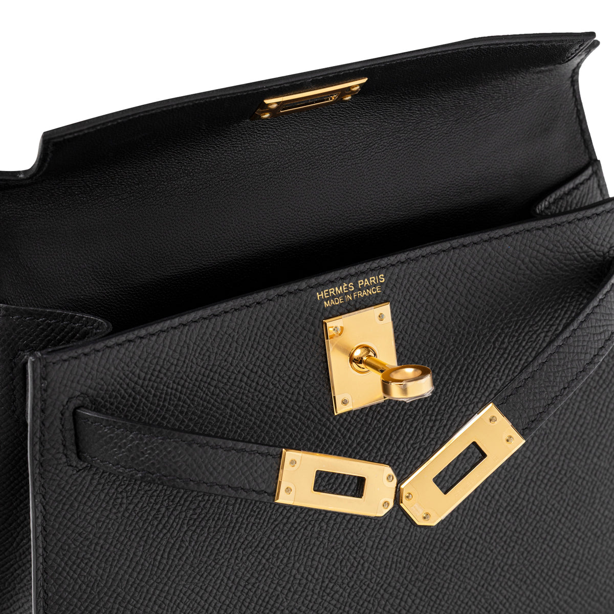 Close-up of Hermès Mini Kelly II Sellier 20 Black Epsom Gold Hardware showing open flap
