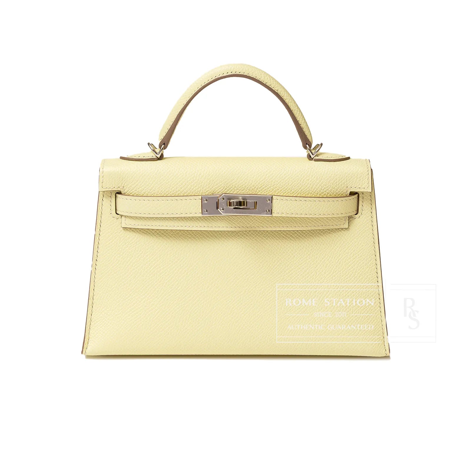 Front view of Hermès Mini Kelly II Sellier 20 Jaune Milton Epsom Palladium Hardware handbag showing handle and clasp detail