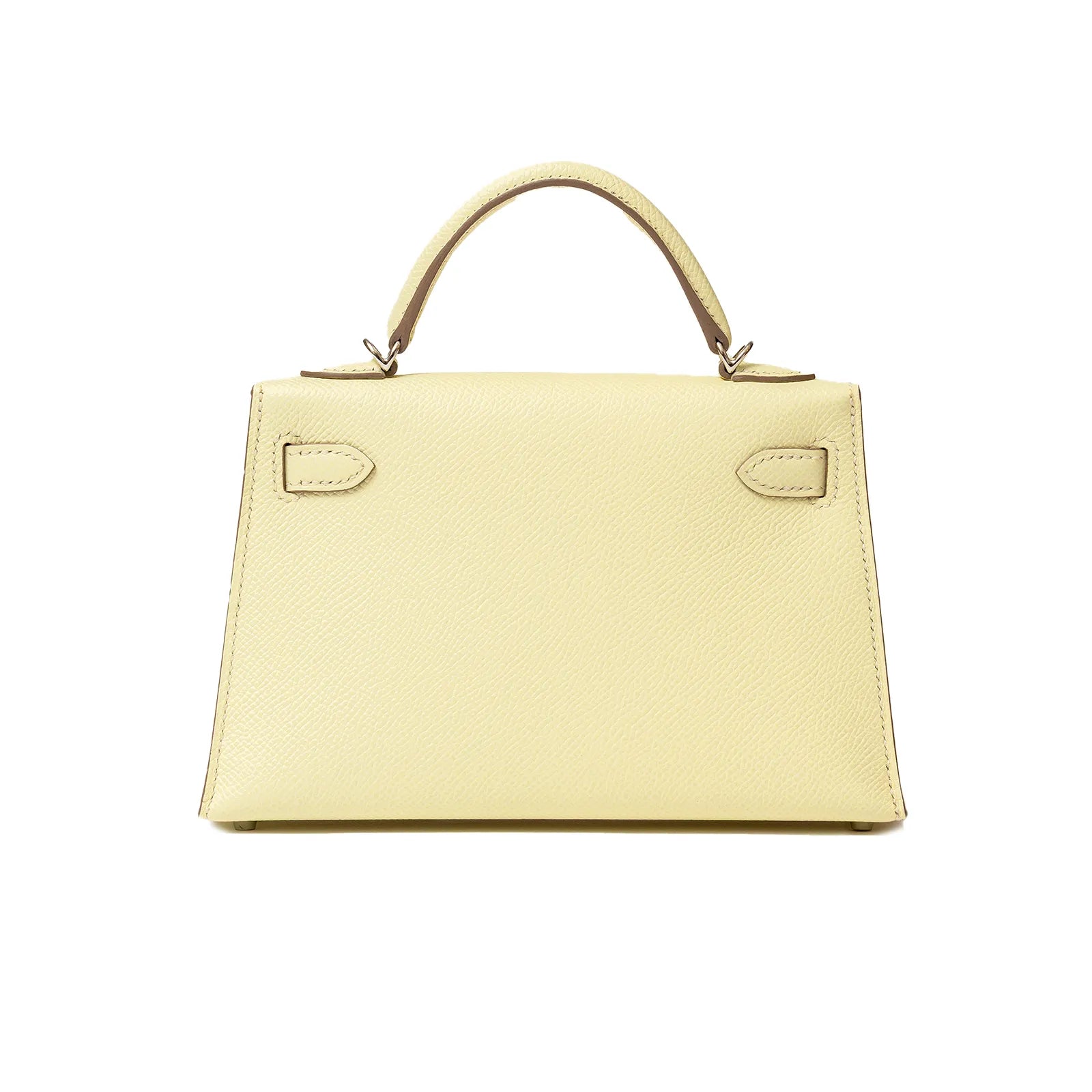 Back view of Hermès Mini Kelly II Sellier 20 Jaune Milton Epsom Palladium Hardware handbag showing structured handle and smooth leather texture