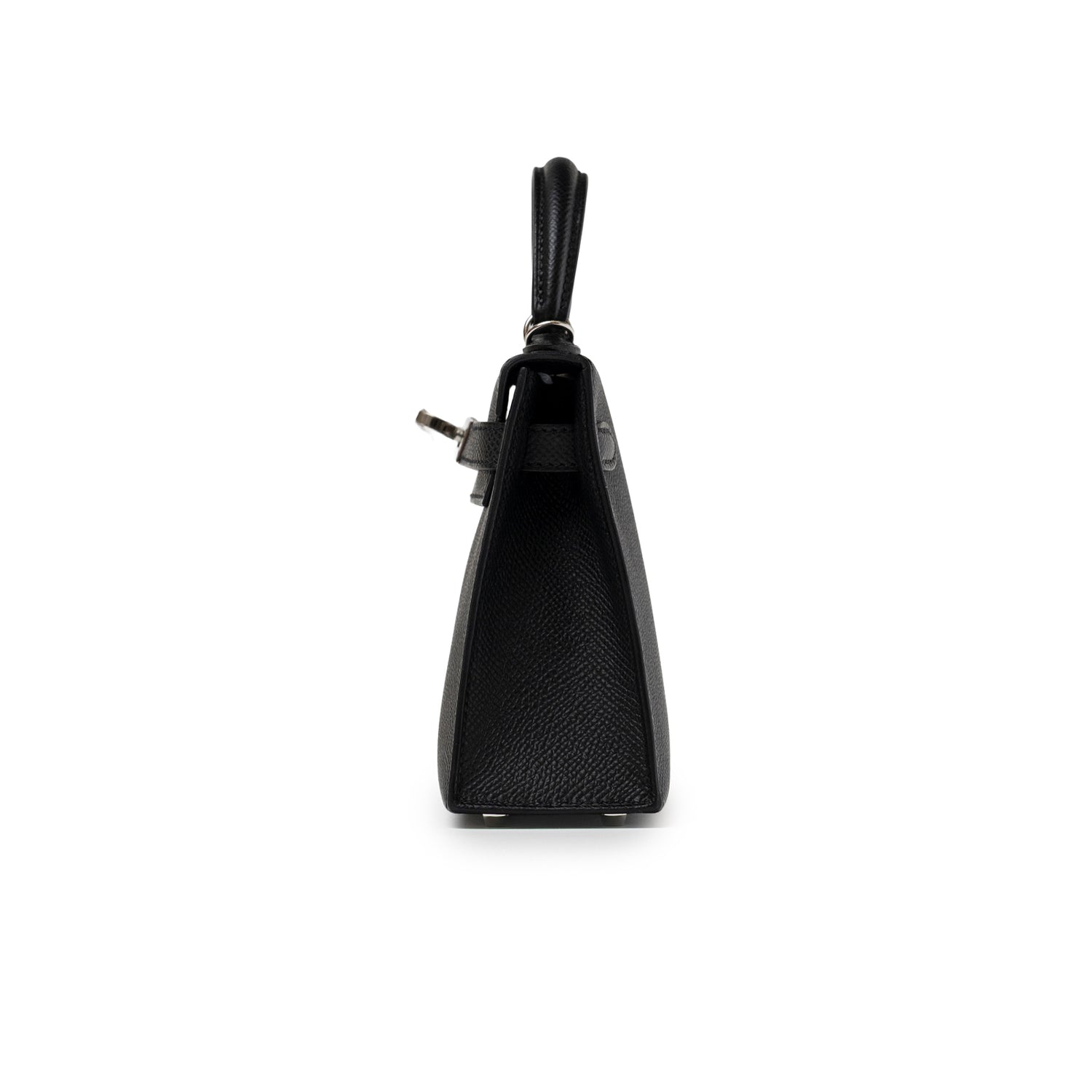 Side view of Hermès Mini Kelly II Sellier Black Epsom Palladium Hardware handbag on white background