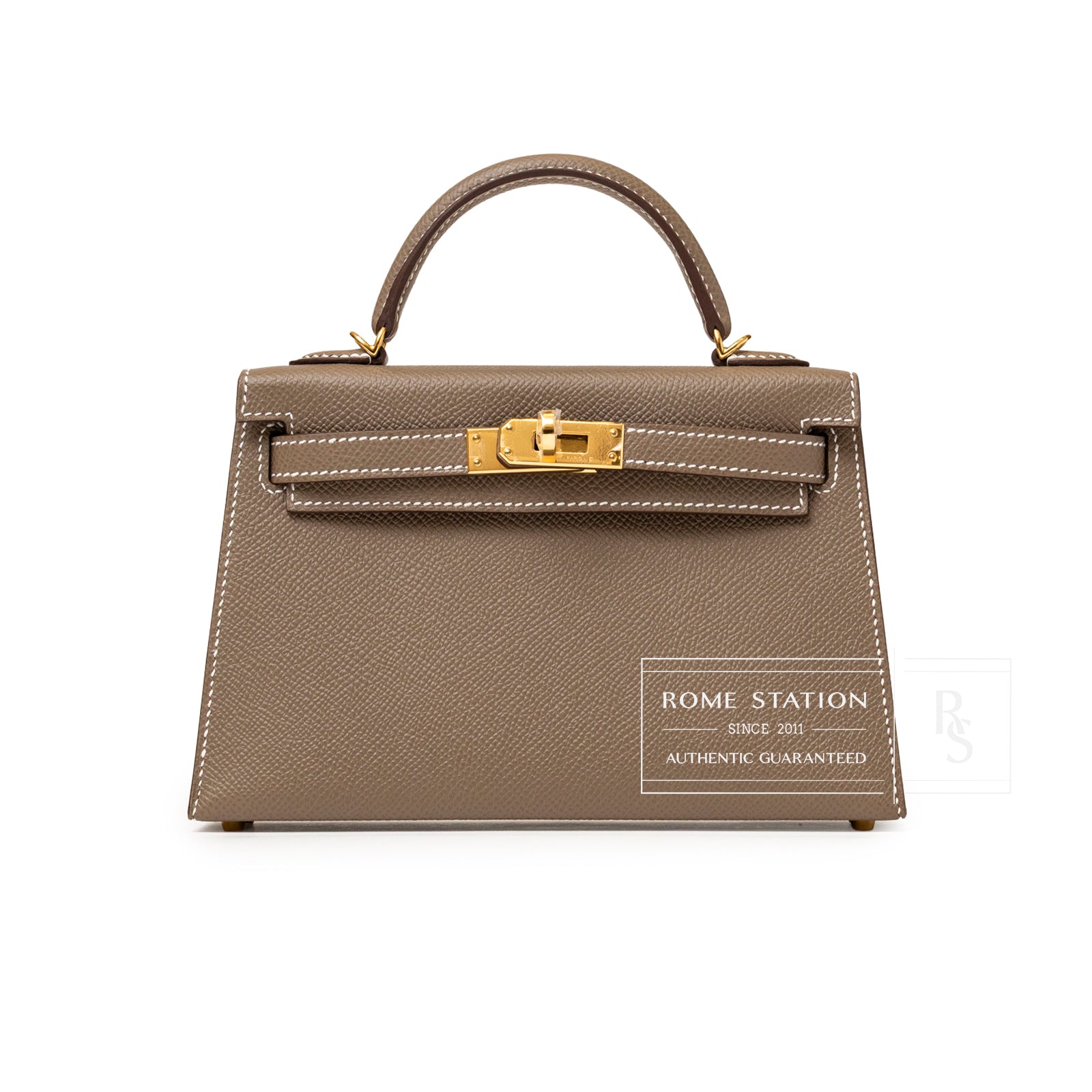 Front view of Hermès Mini Kelly II Sellier Etoupe Epsom Gold Hardware with top handle and visible stitching detail