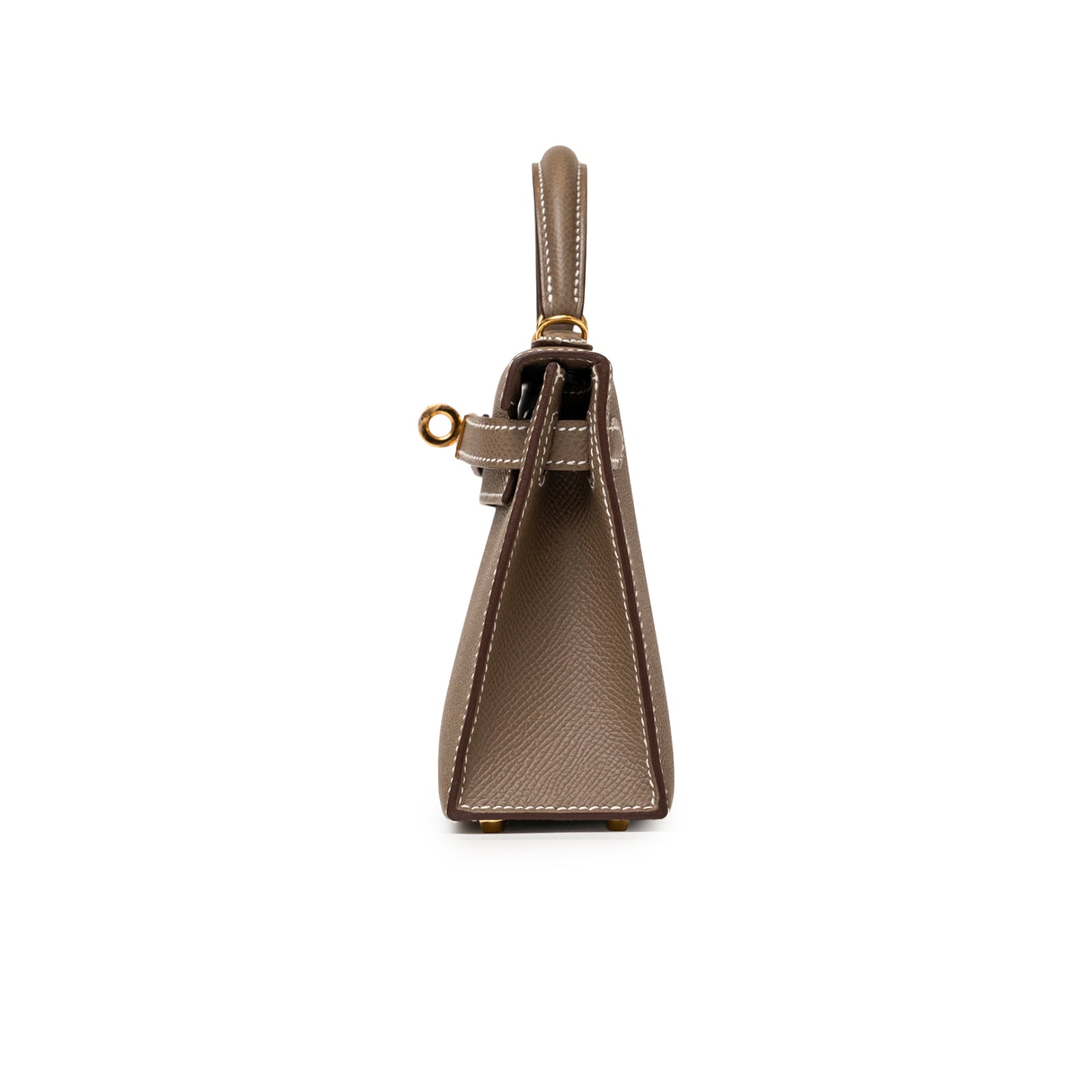 Side view of Hermès Mini Kelly II Sellier Etoupe Epsom Gold Hardware showing structured shape and stitching details