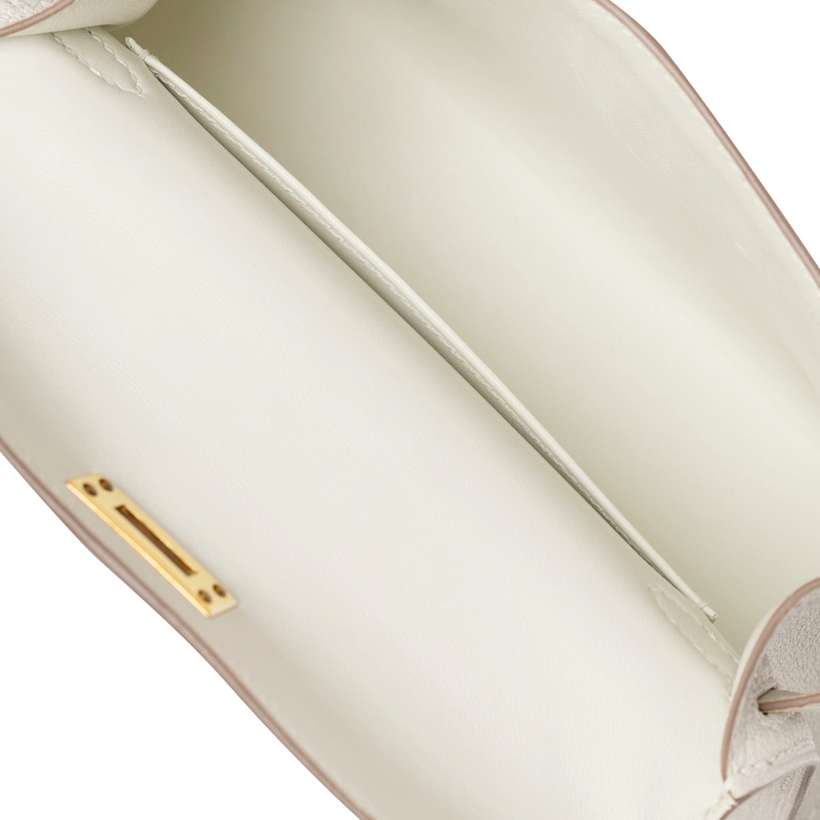 Interior view of Hermès Mini Kelly II Sellier Mushroom Chevre Mysore Gold Hardware showing smooth lining and gold clasp detail