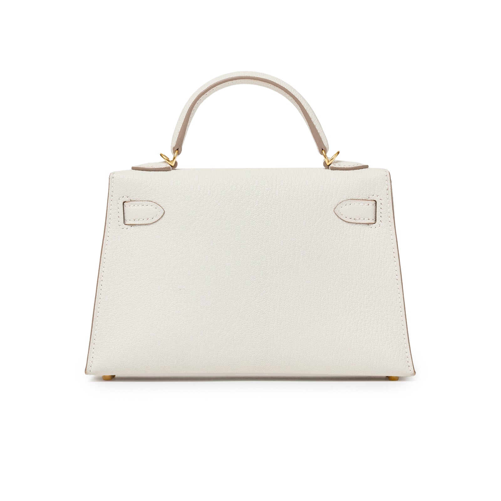 Back view of Hermès Mini Kelly II Sellier Mushroom Chevre Mysore Gold Hardware showing smooth leather and handle detail