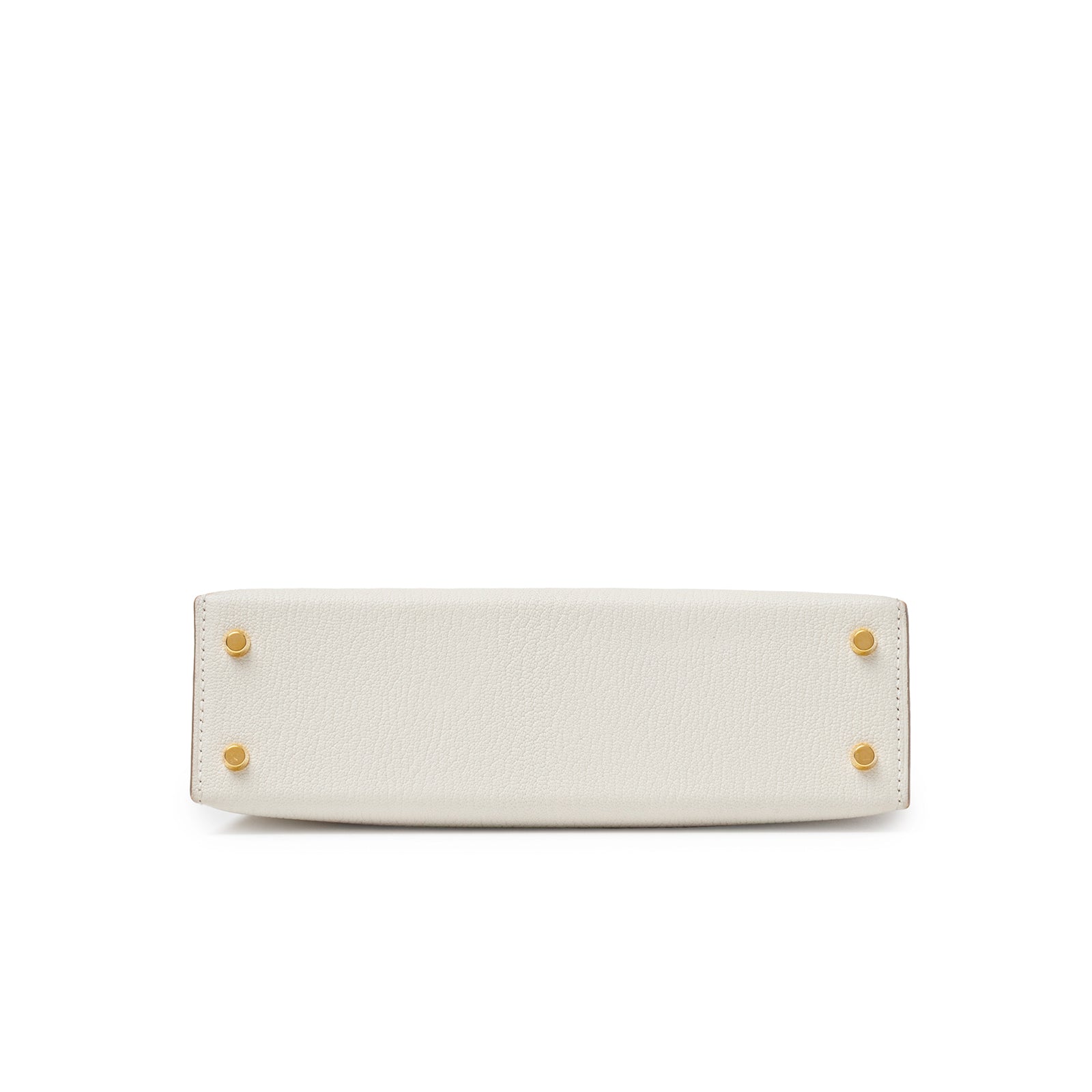 Bottom view of Hermès Mini Kelly II Sellier Mushroom Chevre Mysore Gold Hardware with gold feet and leather texture detail
