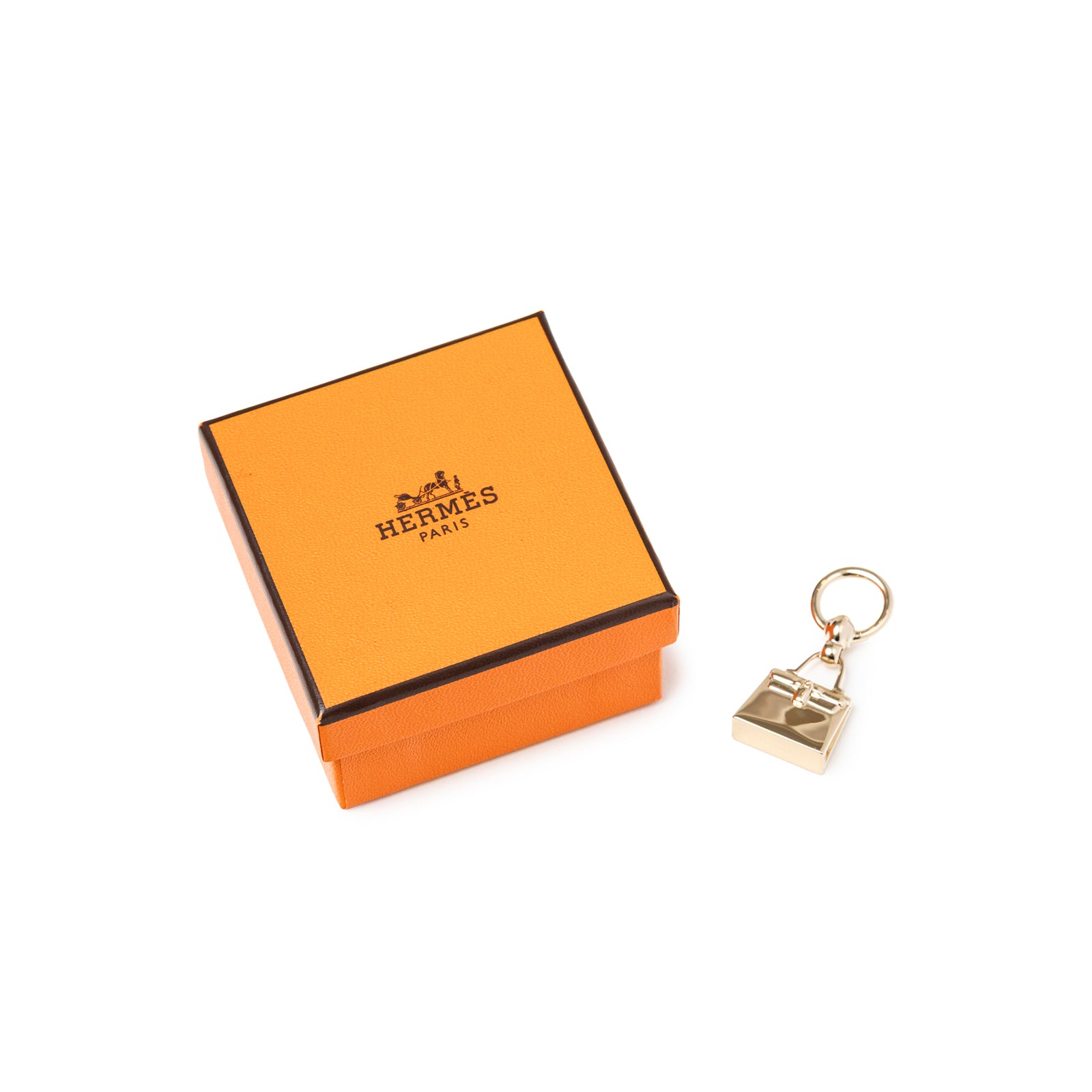 Hermès Mini Kelly Twilly Ring Palladium Plated with signature orange Hermès box