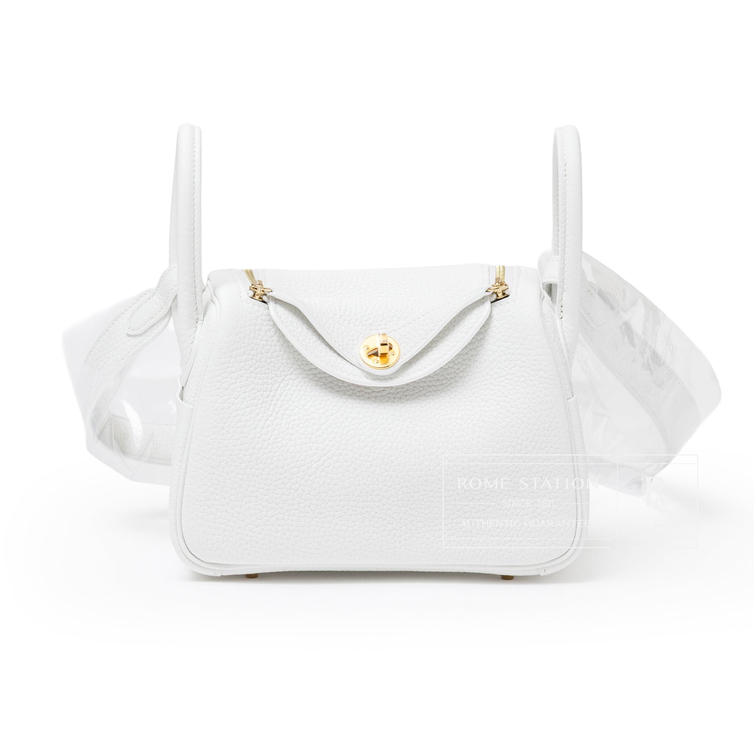 Front view of Hermès Mini Lindy II New White Clemence Gold Hardware showing pebbled texture and gold clasp detail