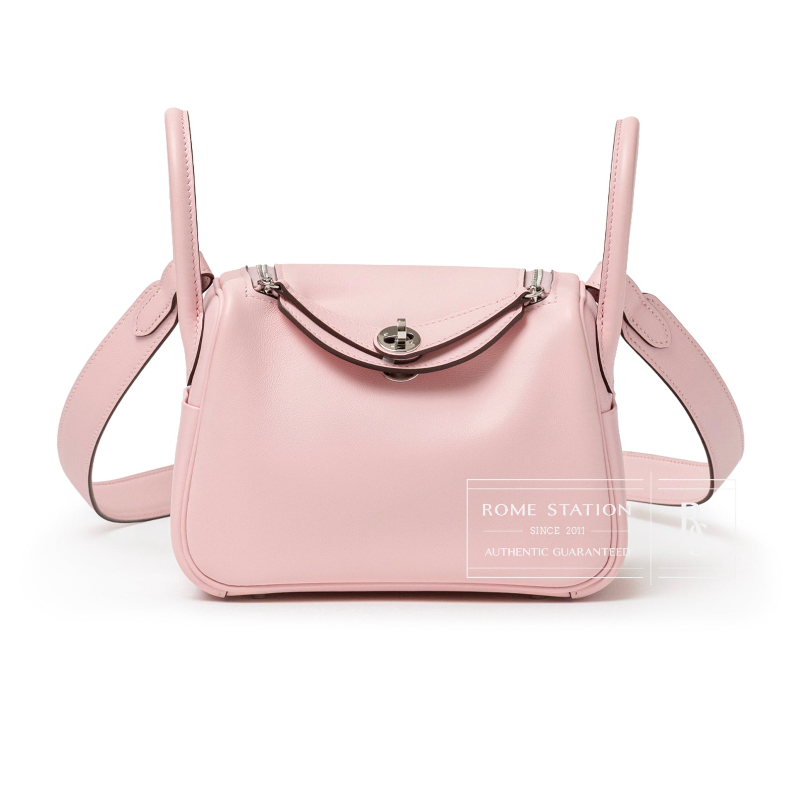 Front view of Hermès Mini Lindy II Rose Sakura Swift Palladium Hardware with top handle and shoulder strap