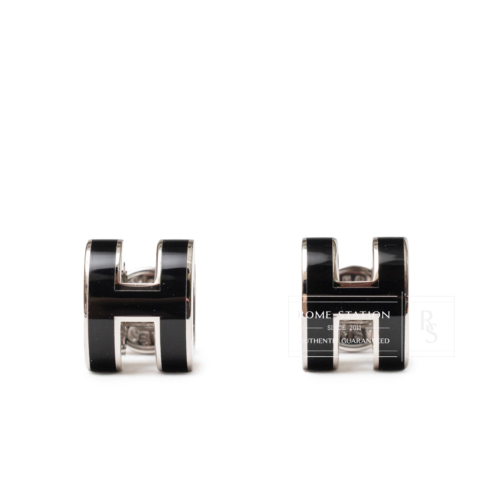 Front view of Hermès Mini Pop H Earrings Black Palladium Plated showcasing glossy black enamel and polished metal edges