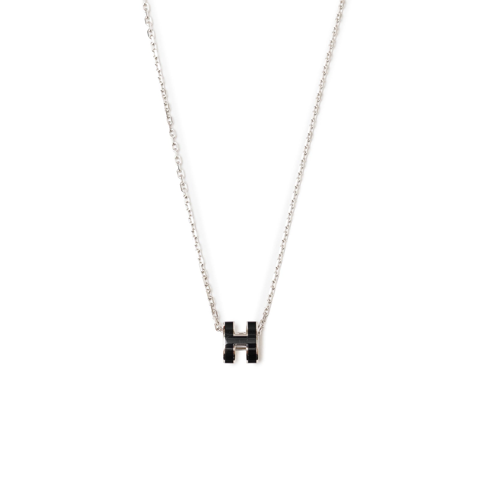 Back view of Hermès Mini Pop H Pendant Black Palladium Plated necklace with delicate chain