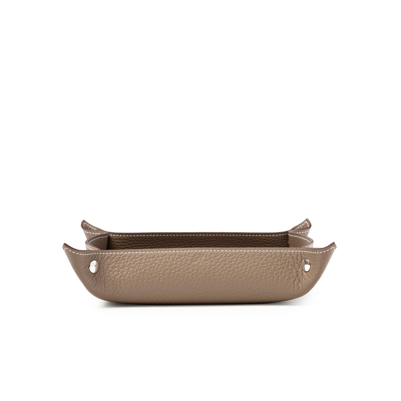 Side view of Hermès Mises et Relances H Evelyne Change Tray Etoupe Clemence in textured leather with silver snaps