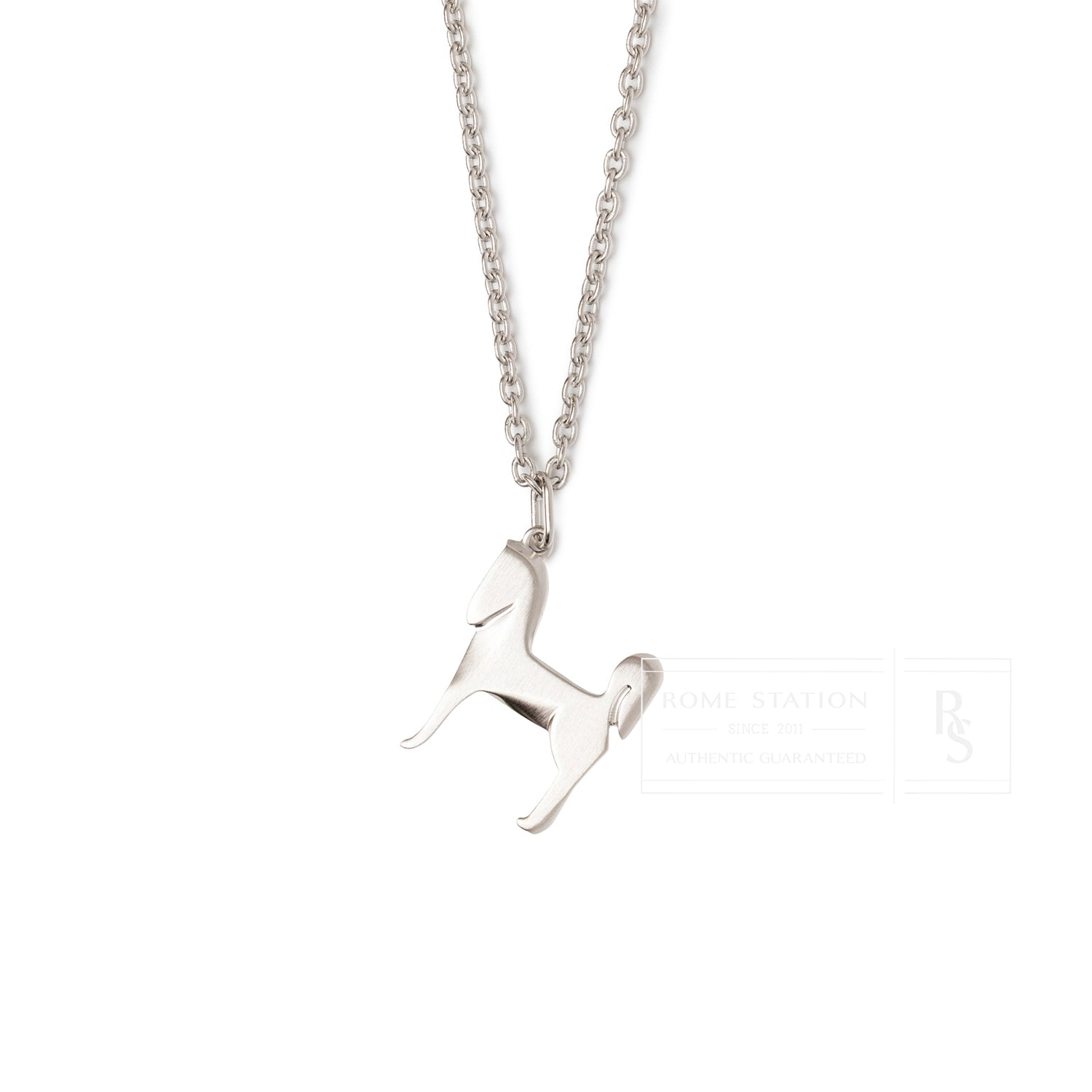 Close-up front view of Hermès Panache Necklace Brushed Palladium with horse-shaped pendant on chain