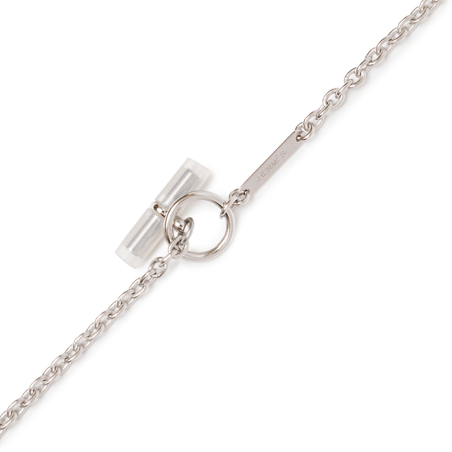 Close-up of the clasp and chain details on the Hermès Panache Necklace Brushed Palladium showing logo engraving.