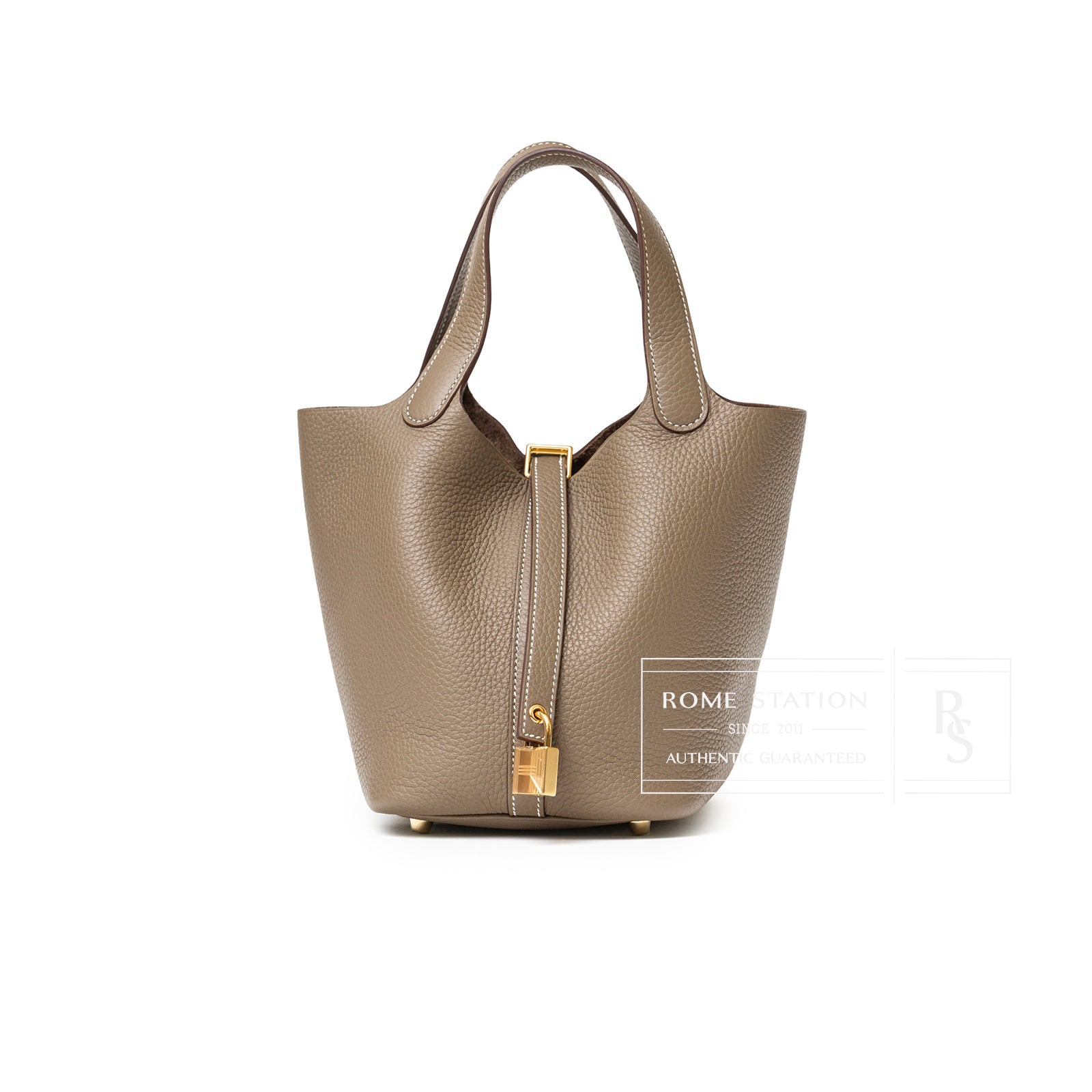 Front view of Hermès Picotin 18 Etoupe Clemence Gold Hardware handbag with textured leather and gold clasp detail.