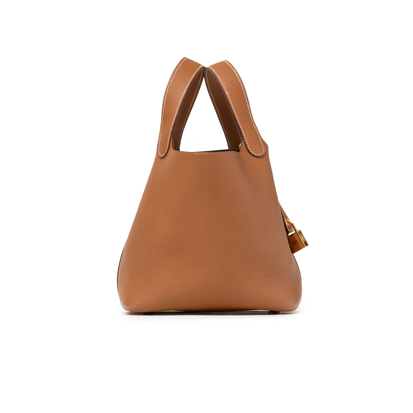 Side view of Hermès Picotin 18 Gold Clemence Gold Hardware D bag in tan leather with stitched handles and gold lock detail