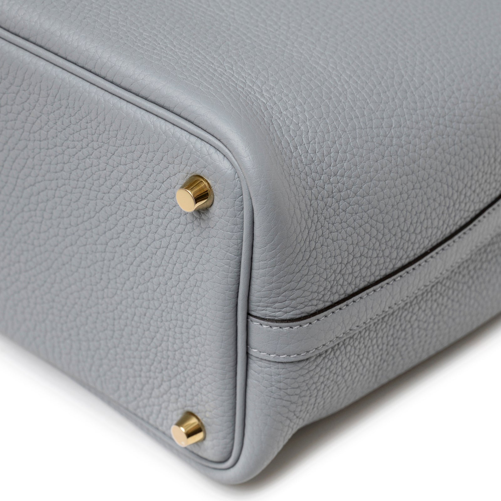 Close-up of Hermès Picotin 18 Gris Pantin Clemence Gold Hardware corner showing pebbled leather and gold studs