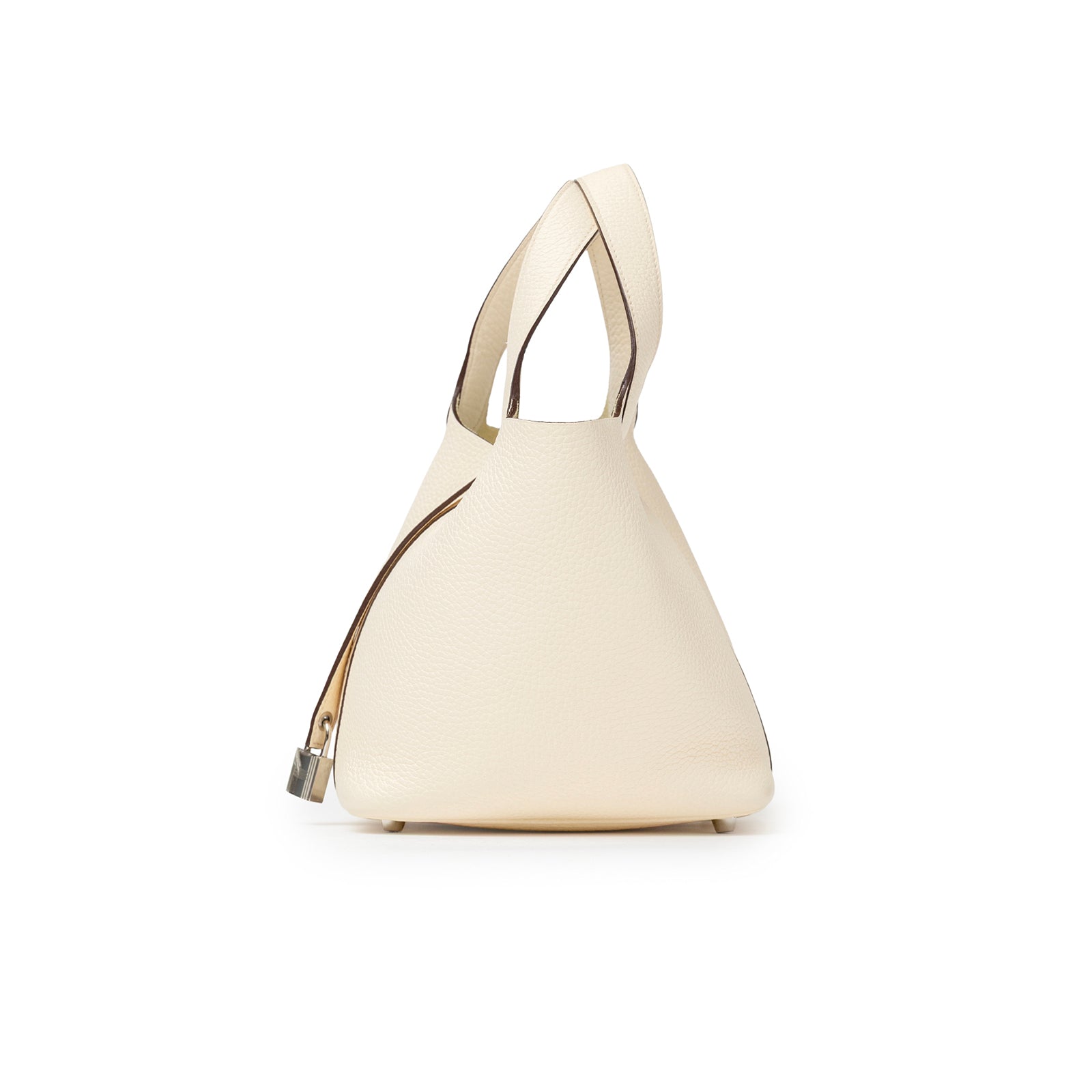 Side view of Hermès Picotin 18 Nata Clemence Palladium Hardware in cream leather with lock detail