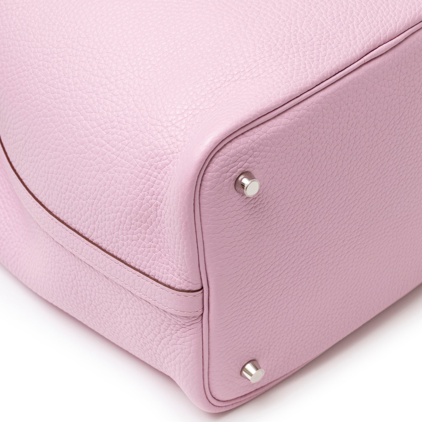 Close-up of bottom corner on Hermès Picotin 22 Mauve Sylvestre Clemence Palladium Hardware showing leather texture and feet