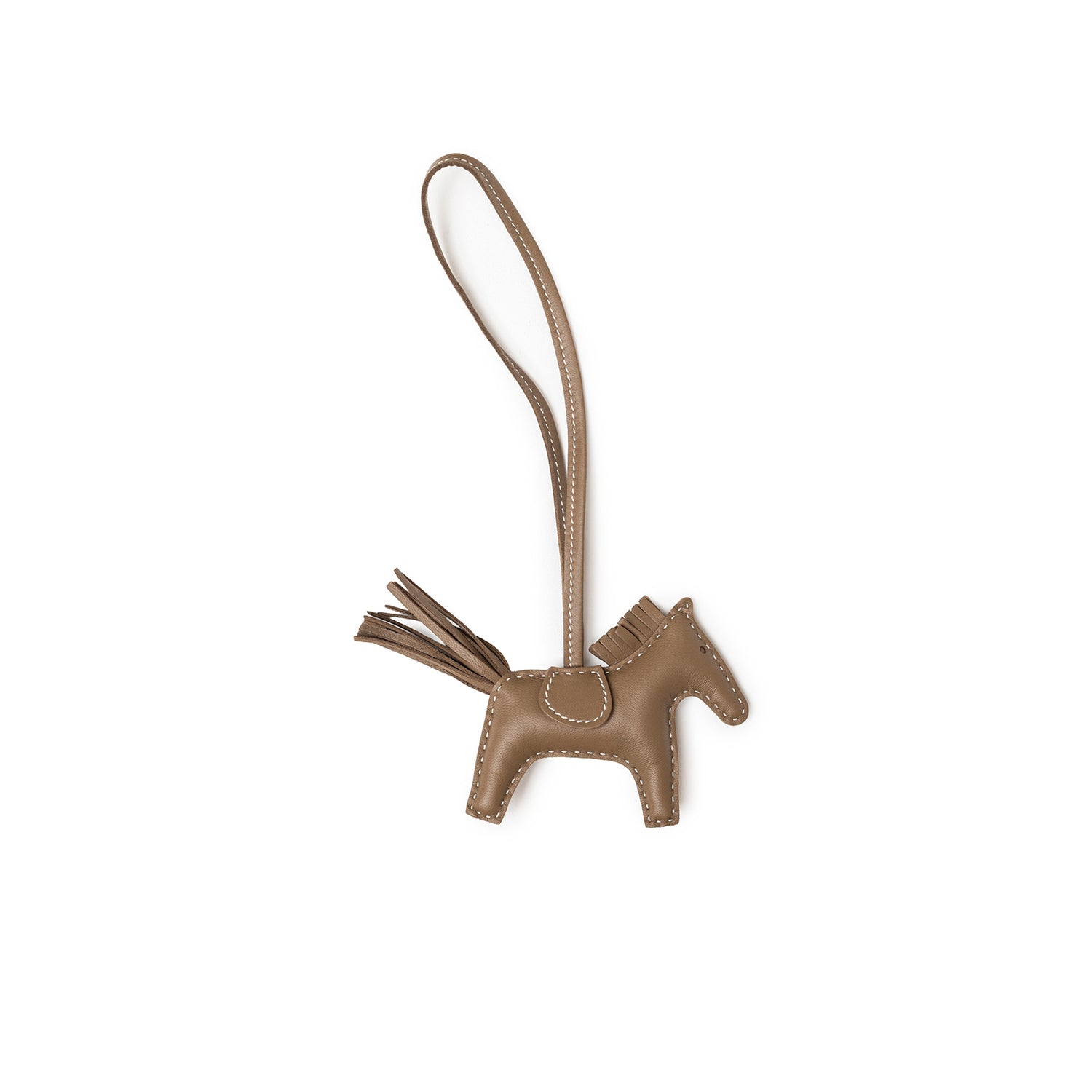 Back view of Hermès Rodeo PM Etoupe Milo Lambskin charm in taupe leather with detailed stitching