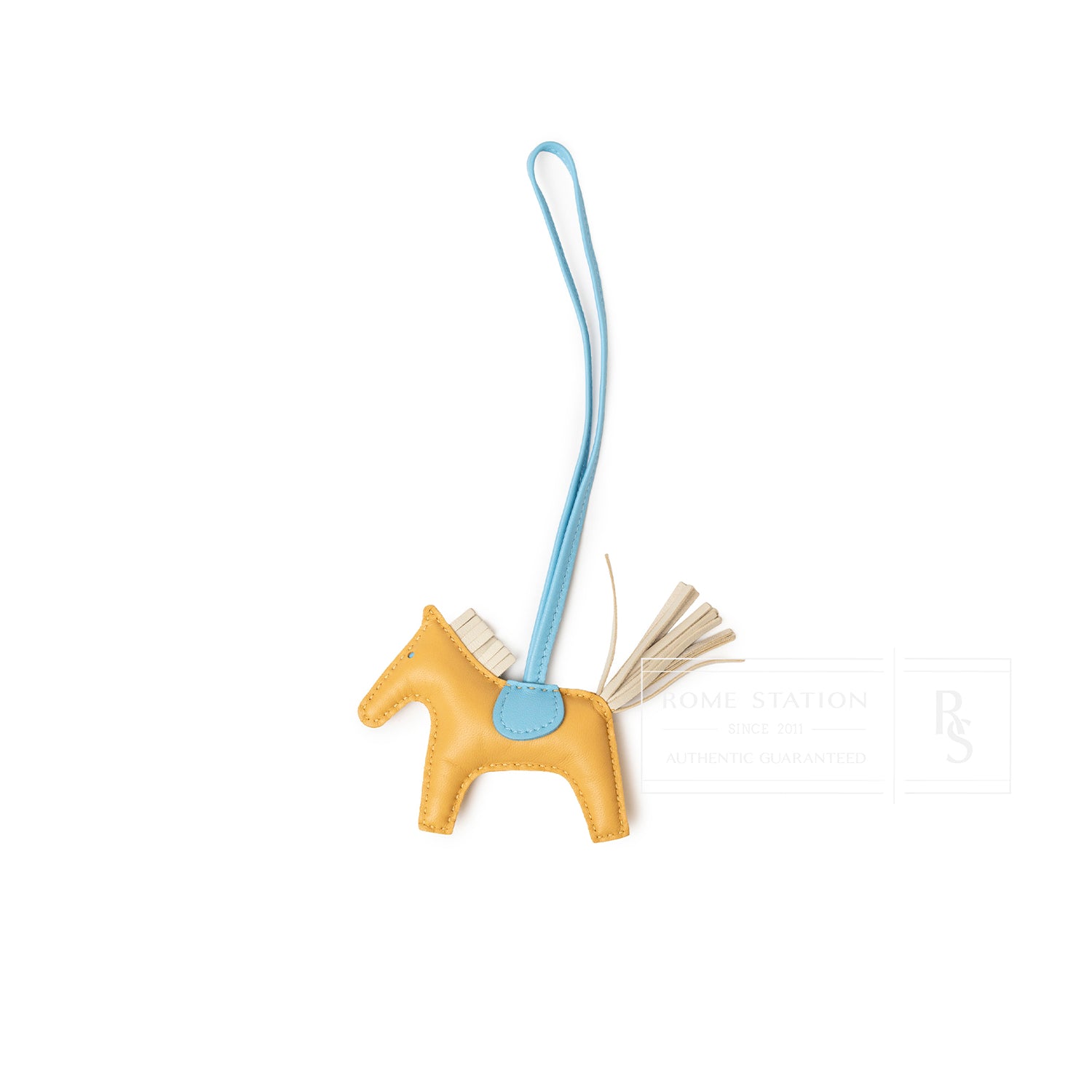 Hermès Rodeo PM Paille Craie Celeste Milo Lambskin charm in yellow with blue strap and cream tail detailed design