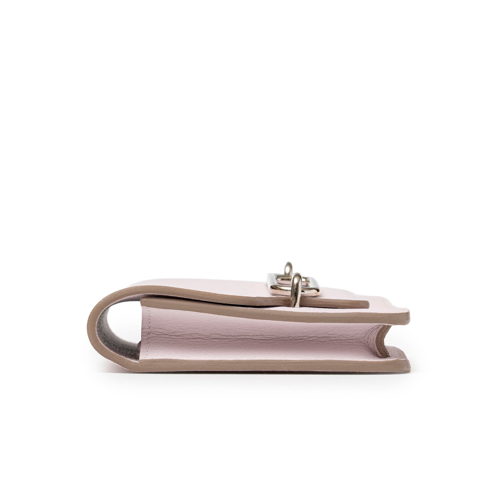 Side profile of Hermès Roulis Slim Wallet Mauve Pale Evercolor Palladium Hardware showing leather texture and edges