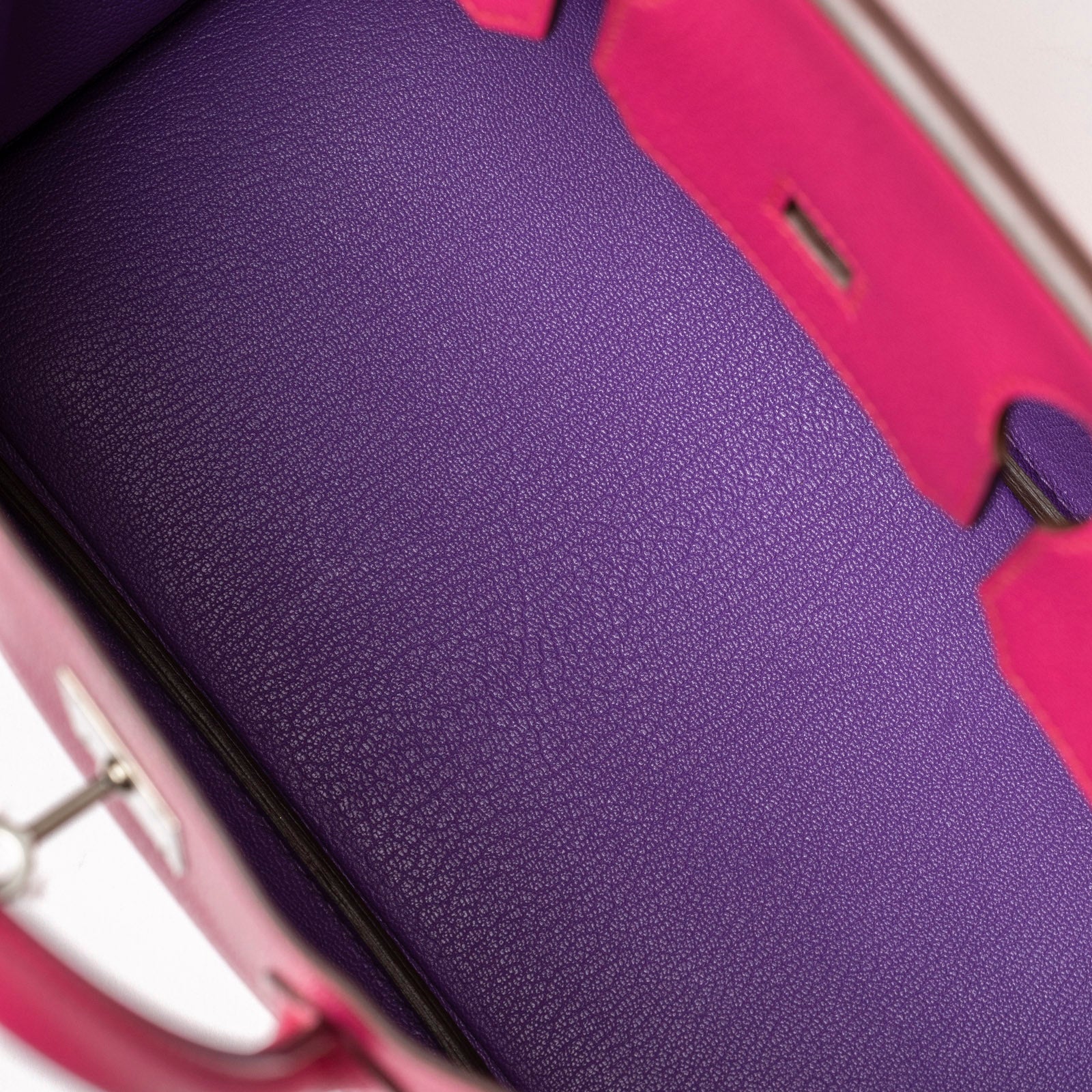 Interior close-up view of Hermès Special Order HSS Horseshoe Birkin 30 Rose Shocking Parme Chevre Mysore Palladium Hardware showing purple textured leather lining and rose shocking trim.