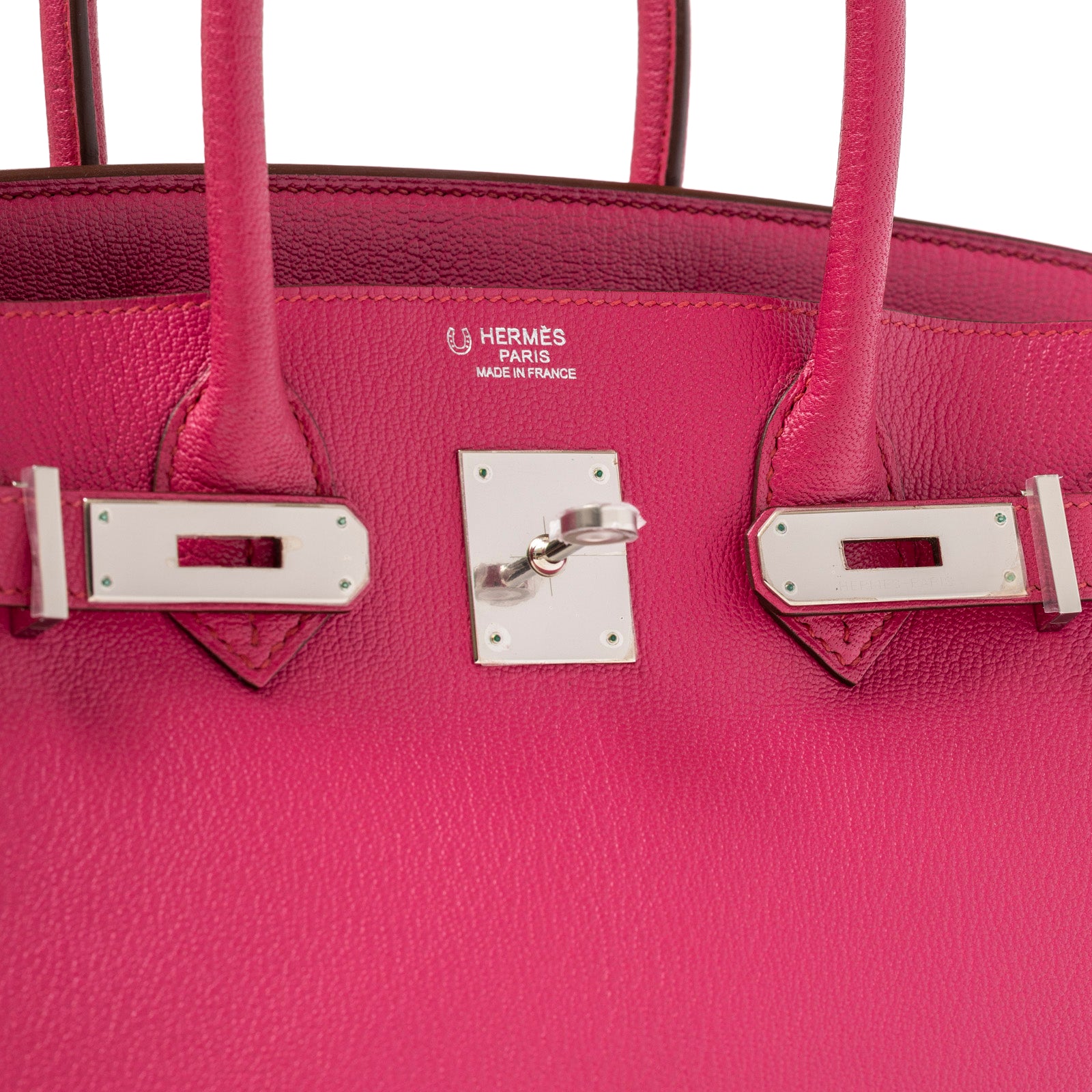 Close-up front view of Hermès Special Order HSS Horseshoe Birkin 30 Rose Shocking Parme Chevre Mysore Palladium Hardware showing clasp detail