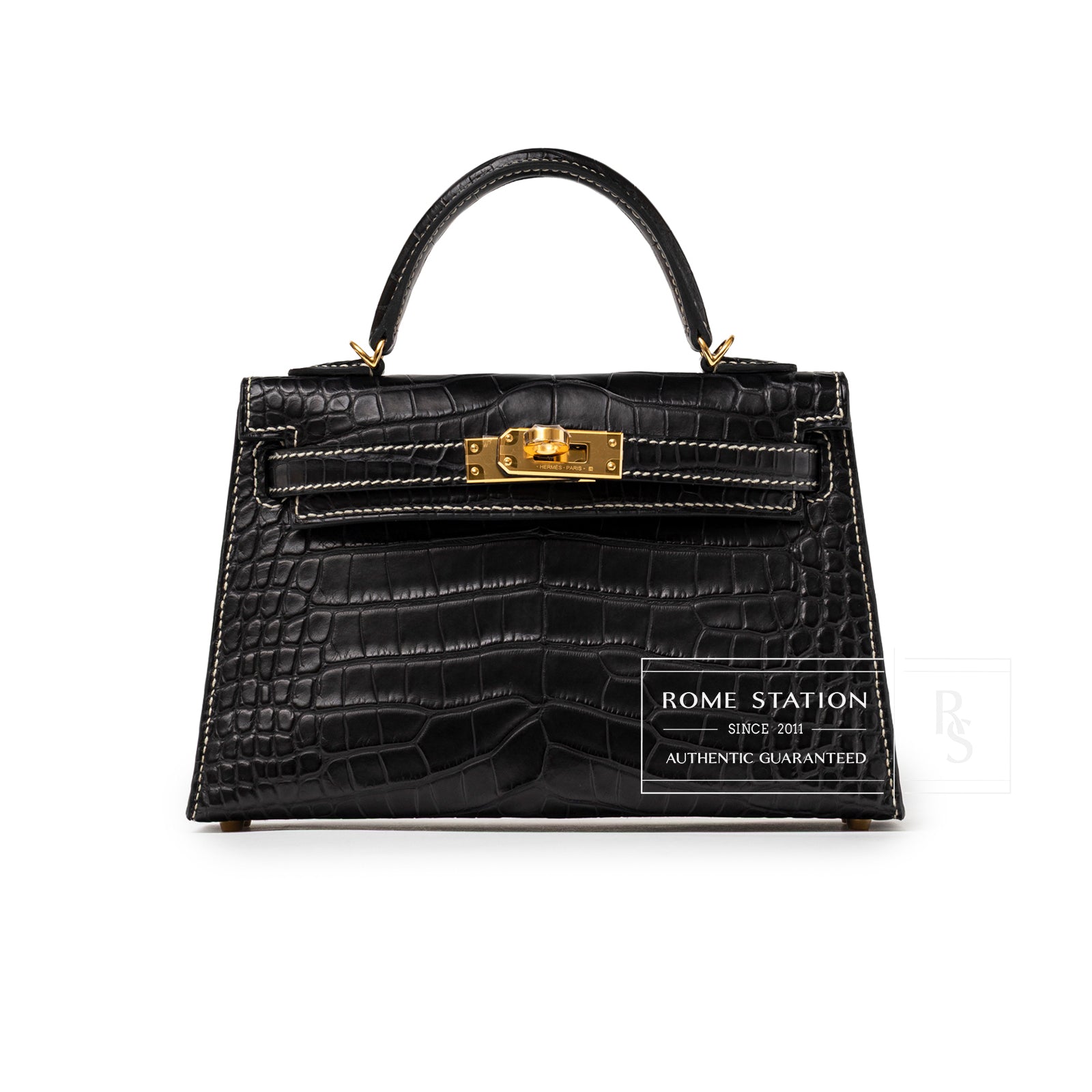 Front view of Hermès Special Order HSS Horseshoe Mini Kelly II Black Gris Matte Alligator Gold Hardware handbag with top handle and gold clasp