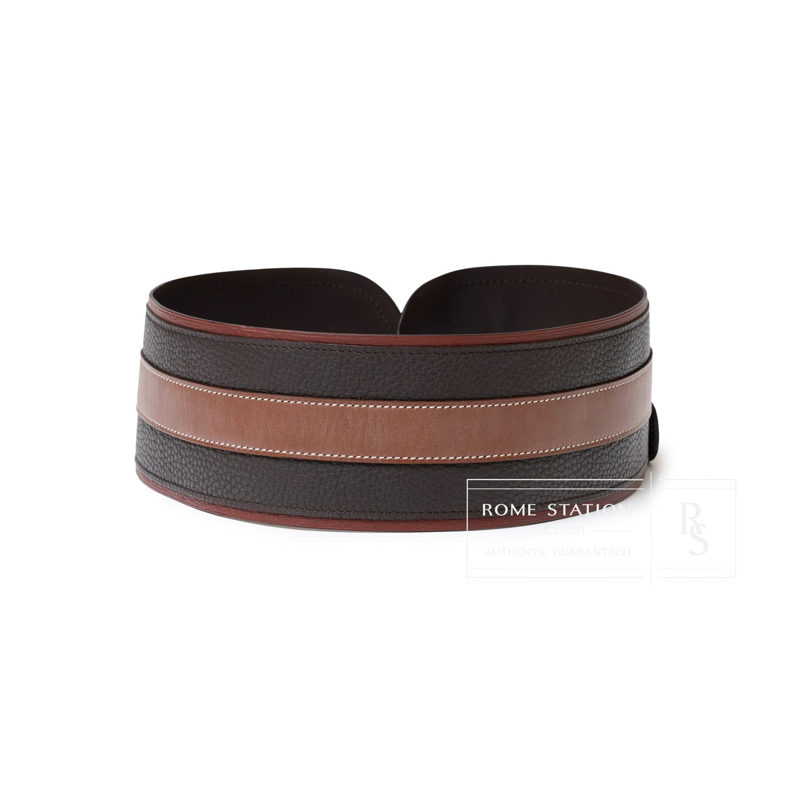 Angled view of Hermès Vintage Waist Belt Brown/Rouge/Natural showing textured and smooth leather panels with detailed stitching