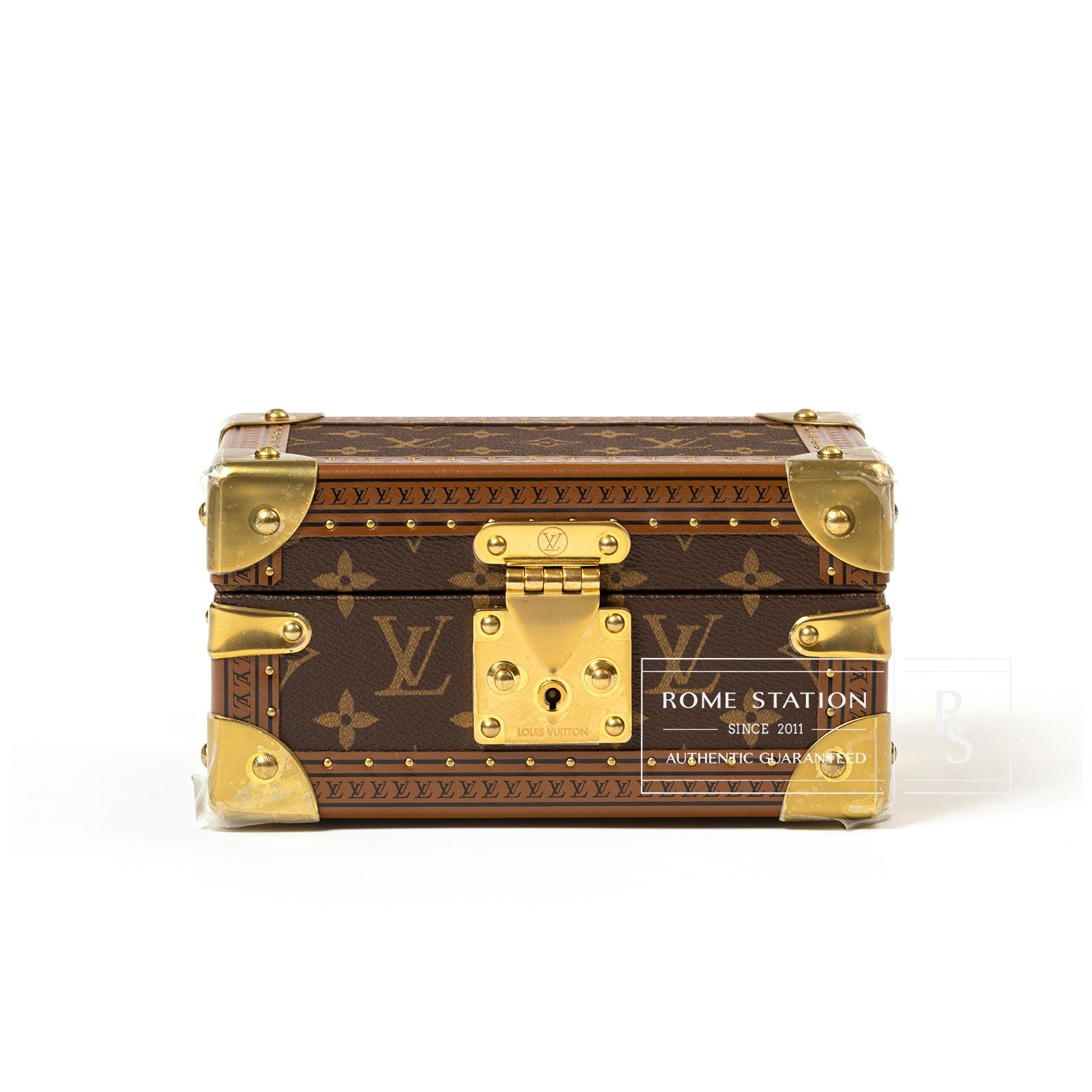 Front view of Louis Vuitton Coffret Tresor 20 Case Monogram Canvas with gold corner accents and lock details