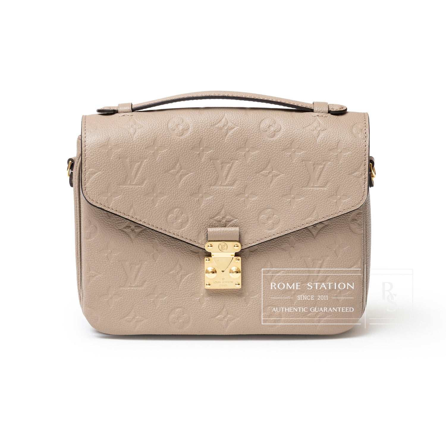 Front view of Louis Vuitton Pochette Métis Monogram Empreinte Turtledove Gold Hardware with embossed leather and gold clasp