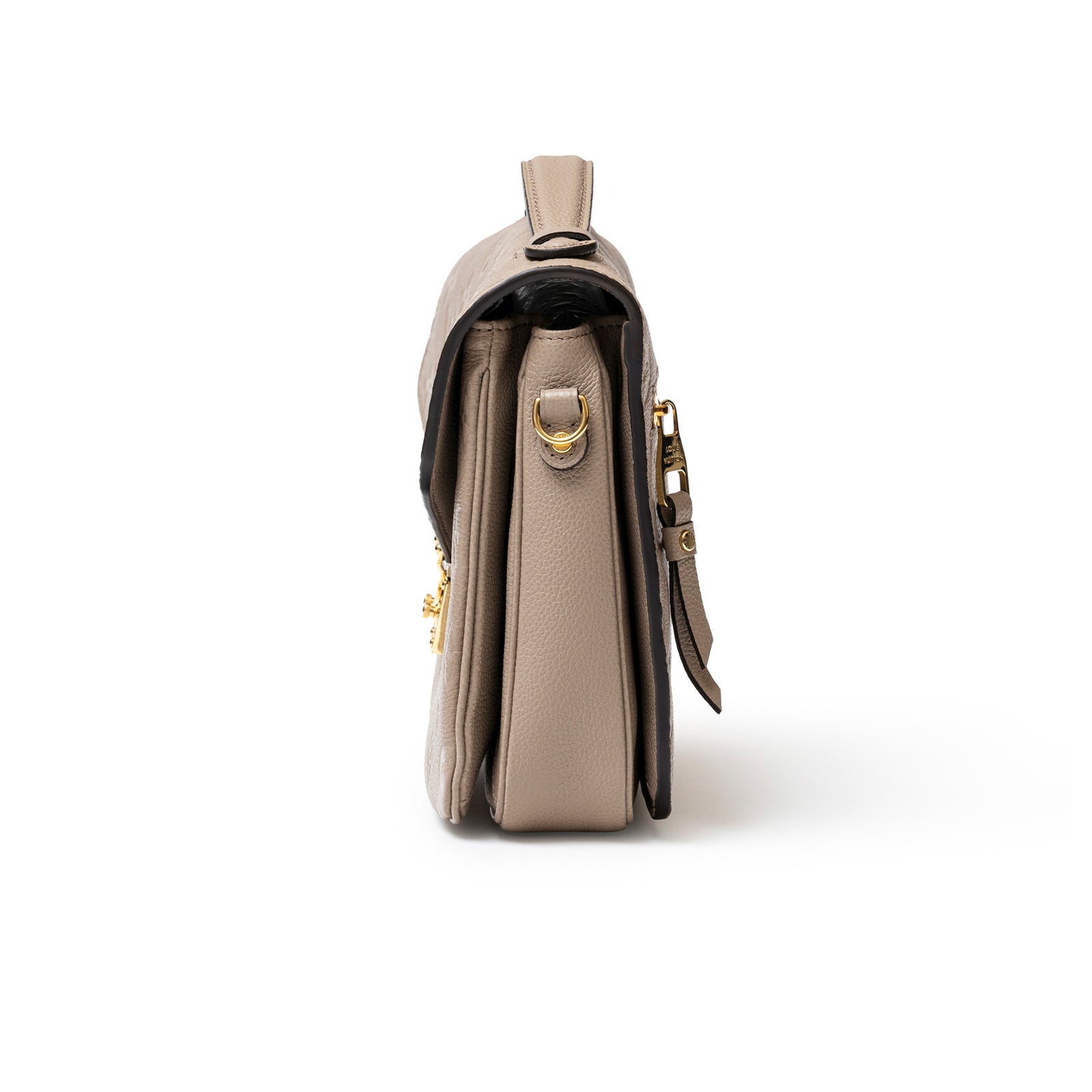 Side view of Louis Vuitton Pochette Métis Monogram Empreinte Turtledove Gold Hardware showing depth and leather texture