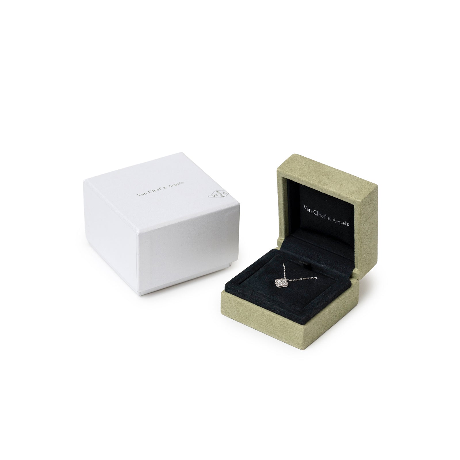 Van Cleef & Arpels Sweet Alhambra Pendant Diamond 18K White Gold displayed open in khaki velvet box beside white outer box