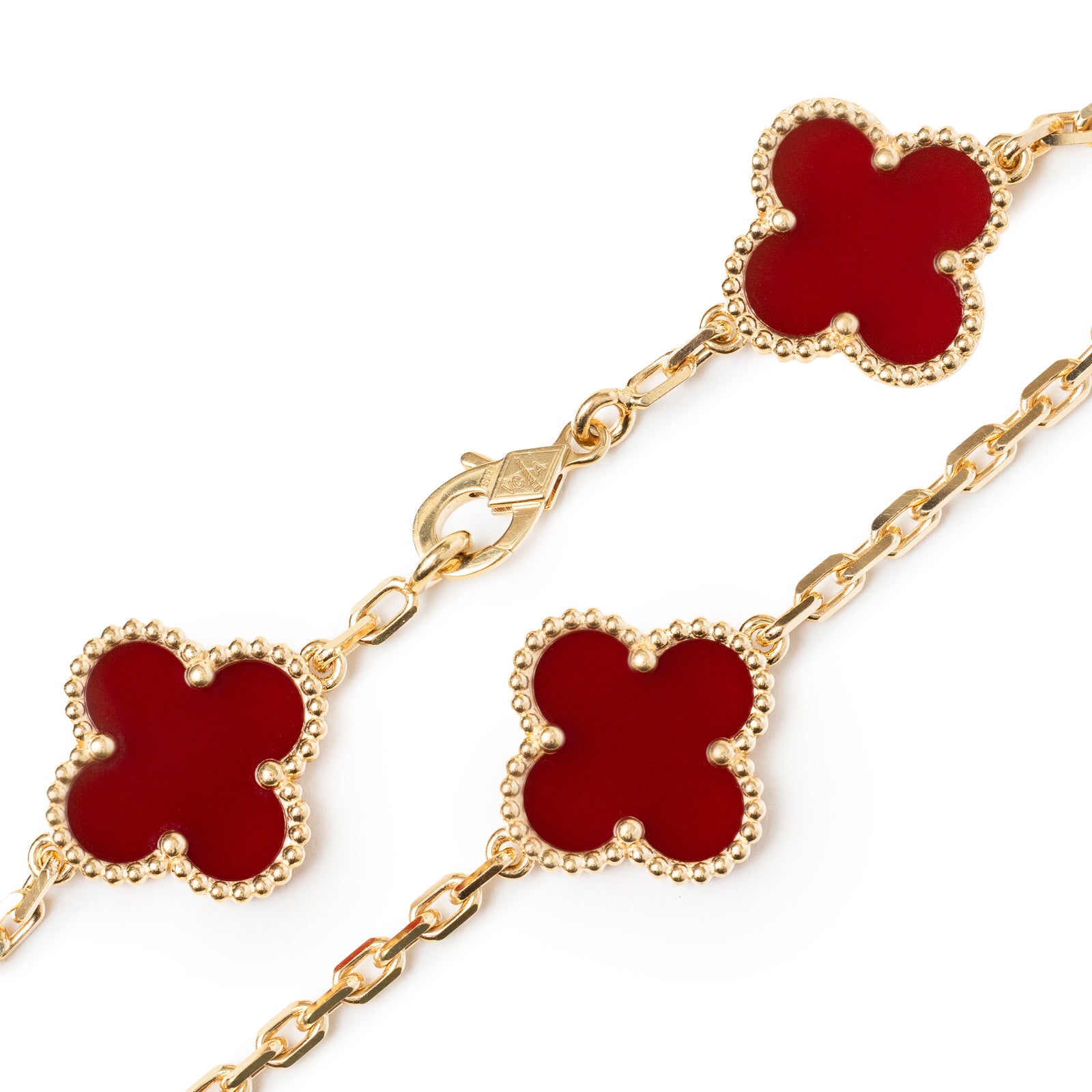 Close-up of Van Cleef & Arpels Vintage Alhambra 5 motifs Bracelet 18K Yellow Gold Carnelian showing clasp and red motifs