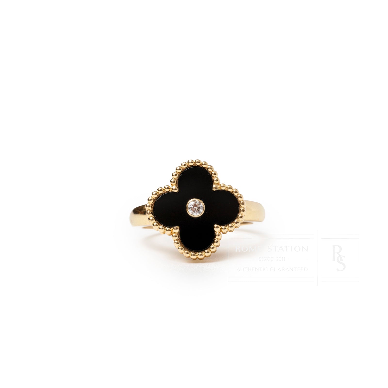 Front view of Van Cleef & Arpels Vintage Alhambra Onyx Diamond Ring featuring a black onyx clover with central diamond